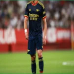 Christos Tzolis Claims Pressure Rests on Arsenal's Premier League Rivals