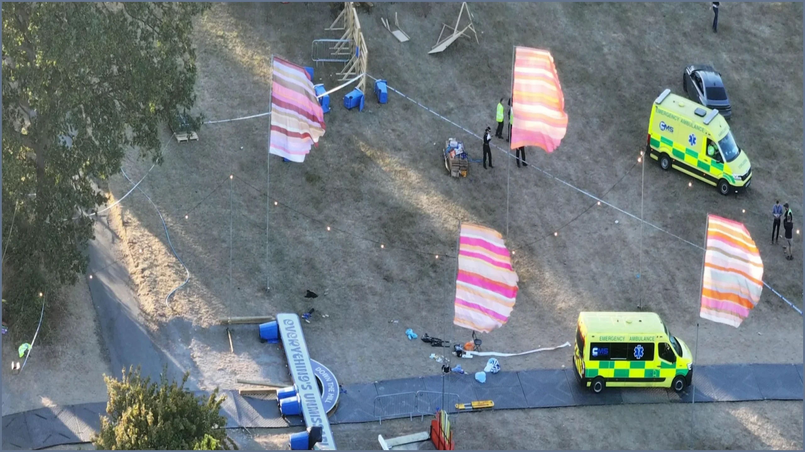 Man Dies and Six Injured After Festival Sign Collapses