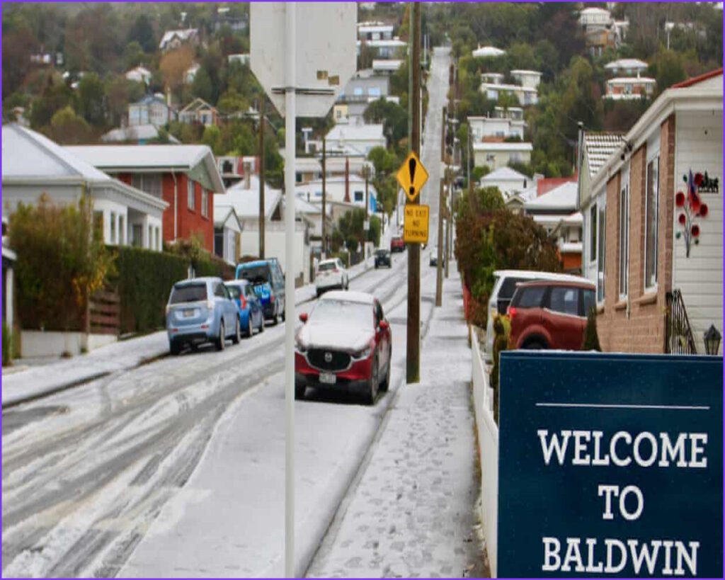 Rare Snow Hits Wellington as New Zealand Shivers in Cold Snap